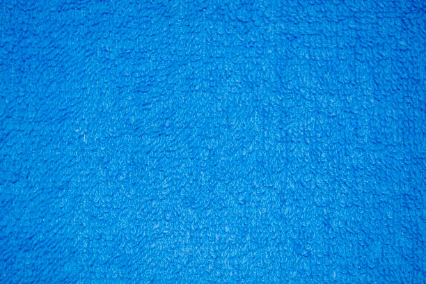 istock Photo Blue Knitted Background. The background is blue. 1697515720