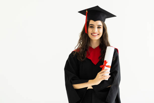Young woman graduating student with diploma on light background