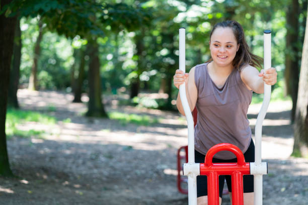 Young woman with Down Syndrome exercise