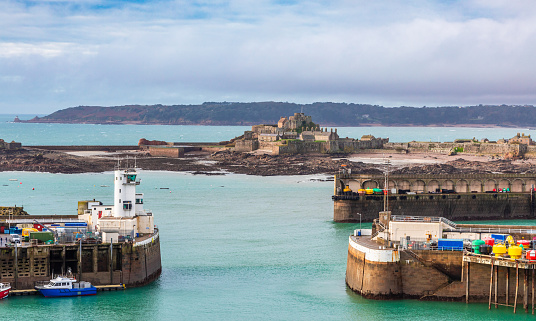 Elizabeth Castle in a low tide panorama with port and gateway in the foreground , Saint Helier, bailiwick of Jersey, Channel Islands, Great Britain