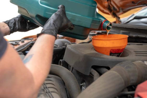 istock Changing automotive oil 1697639235