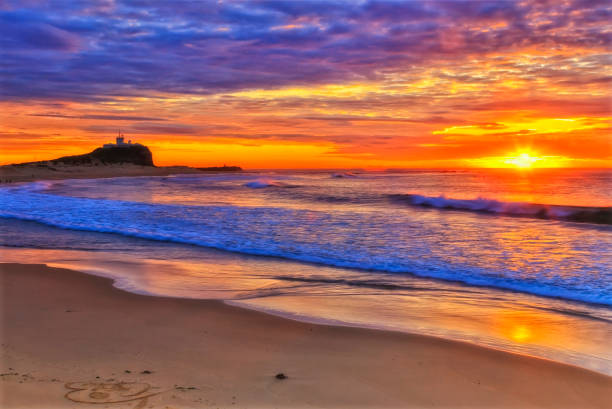 istock Sea Nobbys sand sun bright 1697644703