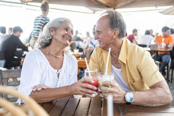 istock Elderly couple drinking juice 1697731784
