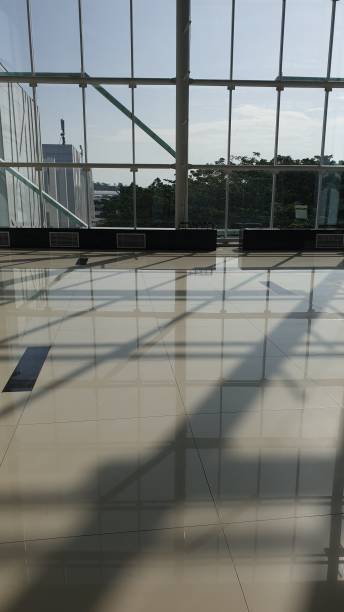 istock Shadows of buildings seen from glass 1697749491