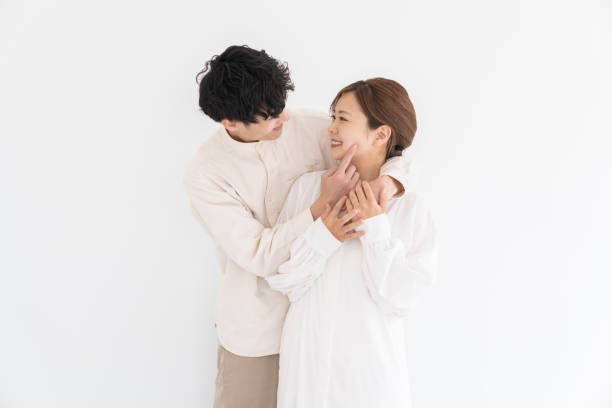 istock asian couple , white background 1697779999