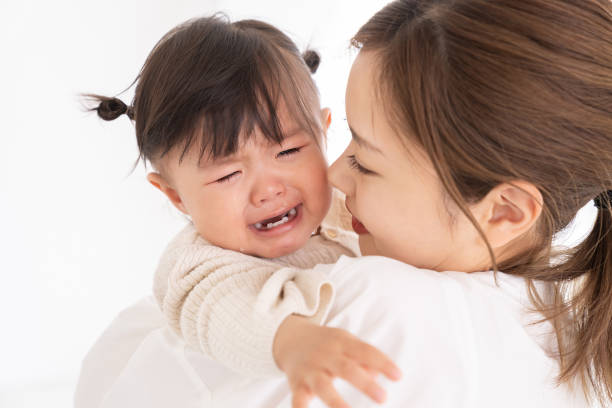 asian mam and daughter, cry stock photo