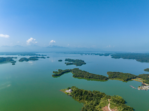 Aerial view of the beautiful natural scenery of Qiandao Lake. Clear lake water and green mountainous natural landscape.