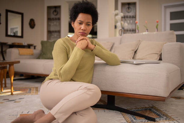 istock Unhappy African-American woman 1697802837