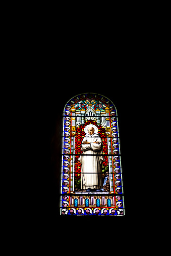 Poitiers, Vienne, Nouvelle-Aquitaine, France: Saint-Pierre de Poitiers Cathedral - stained glass window displaying the crucifixion.