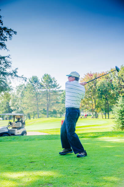 istock Amateur golfer swinging ball 1697966164