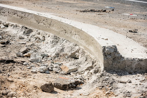 This is an abstract photograph of a concrete street curb at a road construction site in Orlando, Florida, USA.