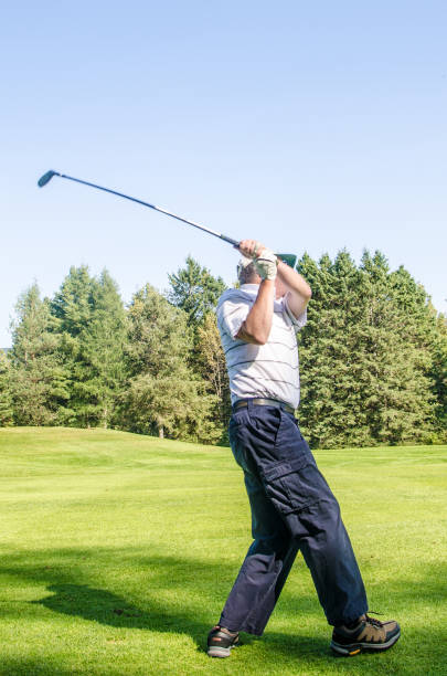 istock Amateur golfer teeing off 1697972752