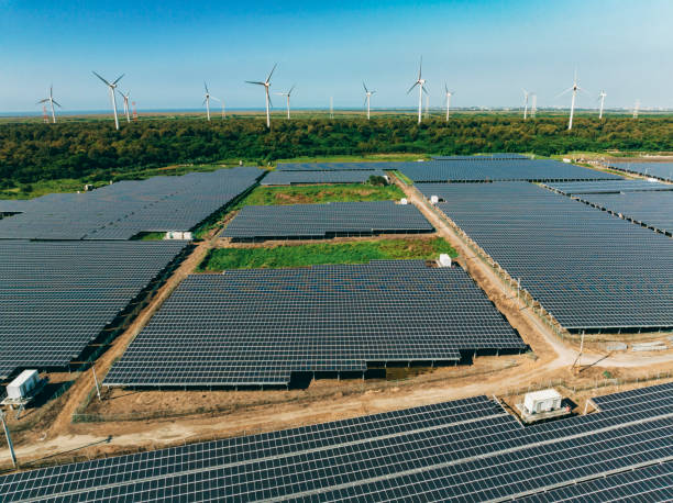 istock Drone Point View of Wind Turbine and Solar Panels 1697975426