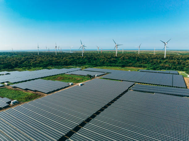 istock Drone Point View of Wind Turbine and Solar Panels 1697975429