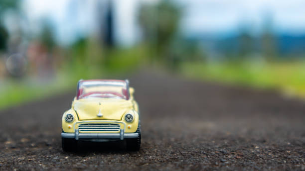 istock minahasa, Indonesia : January 2023, toy car in the rice field 1698037313