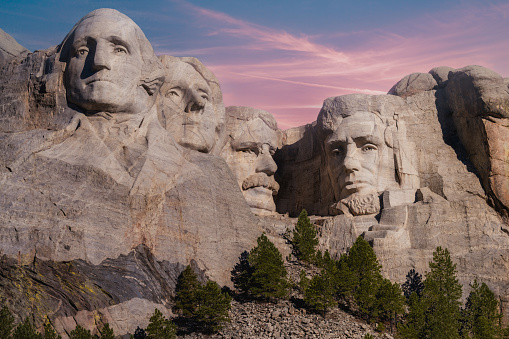 Mount Rushmore is one of the most iconic landmarks in the United States, and it is even more breathtaking at sunset. The golden light of the setting sun casts a warm glow over the monument, highlighting the faces of the four presidents and the mountain itself. This photo captures the beauty of Mount Rushmore at its finest.