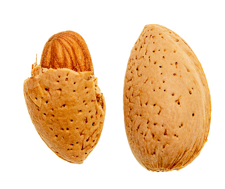 Peanuts isolated on white background, macro shot