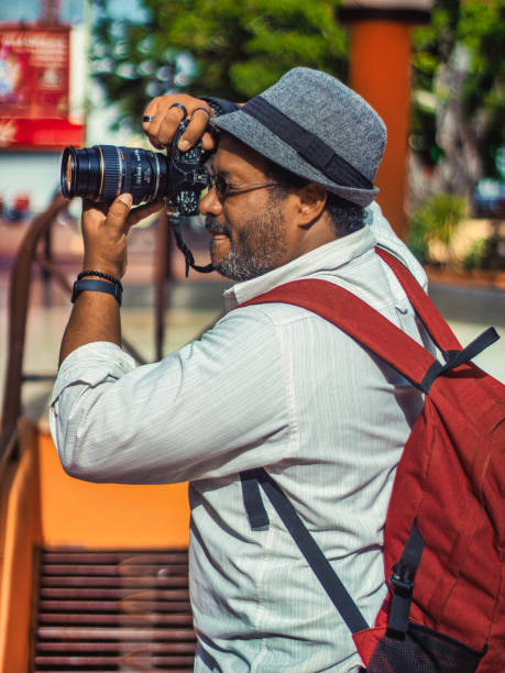 istock Photographer taking photographs 1698148393