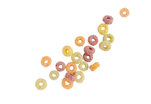 istock Falling colorful corn rings isolated on white background with clipping path. 1698148617