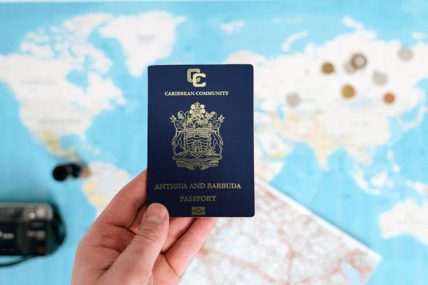 istock caribbean passport holding in hand 1698182238