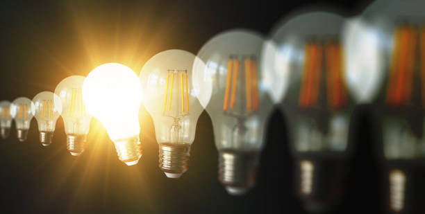 istock An illuminated or glowing lightbulb among other unlit bulbs on a dark background represents new ideas, innovation, creativity, understanding, knowledge, and inspiration. 1698183851