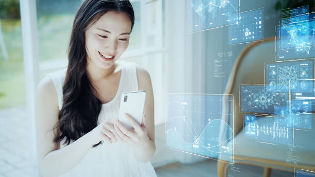 istock Young asian woman using a smart phone. Communication network concept. Digital transformation. 1698198566