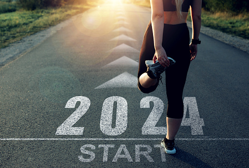 New Year 2024 with new ambitions, challenge, plans, goals and visions.Sports girl who wants to start the year 2024. Concept of new professional achievements in the new year and success