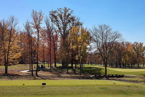 View of a golf course in the autumn with colors