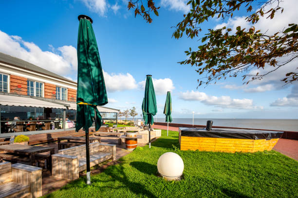 istock Beach with beach chairs and dike at the south beach in Wilhelmshaven, Germany 1698244106