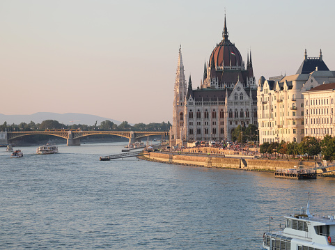 Budapest, B, Hungary - August 20, 2023: Hungarian Parliament building and the Danube River at sunset