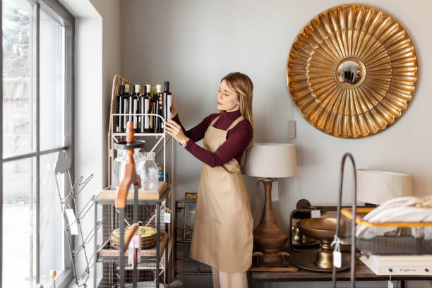 istock Female Entrepreneur Working in a Home Decor Store 1698300487