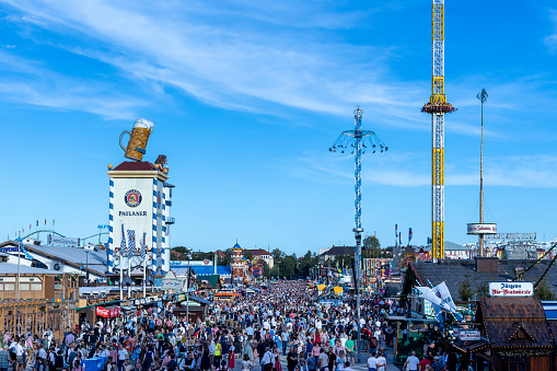 Oktoberfest, Theresienwiese, Munich, Bavaria, Germany, September 2023, view from the Bavaria along the Kaefer tent, Paulaner and Loewenbraeu