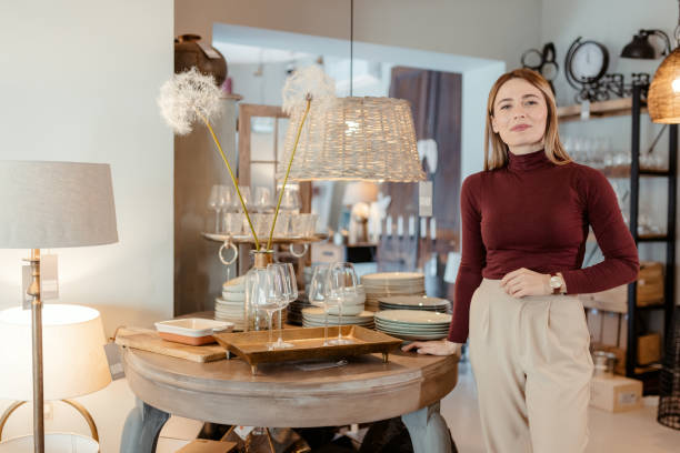 istock Female Entrepreneur Looking at Camera in a Home Decor Store 1698300873