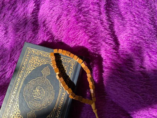 istock Al Quran, Tasbih, Prayer rug. 1698311040