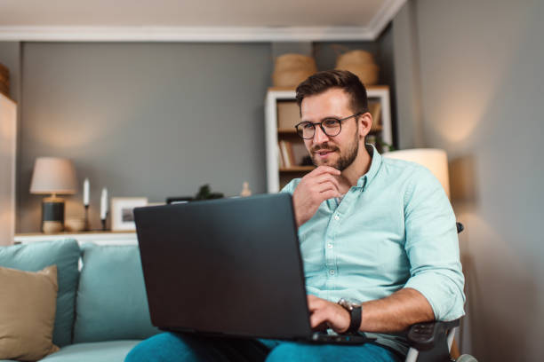 istock Handsome disabled businessman in office 1698339244