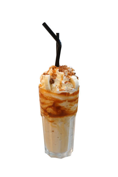 istock Banana milkshake isolated on white background 1698352580