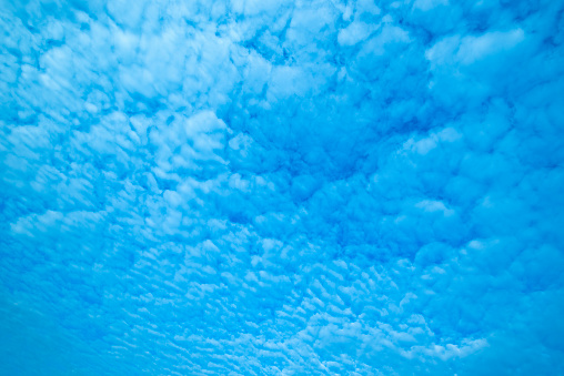 White clouds and bright blue sky background