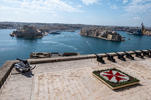 Valletta, Malta, May 1, 2023. View of the Three Cities from Upper Barrakka Gardens and Fort Rinella.