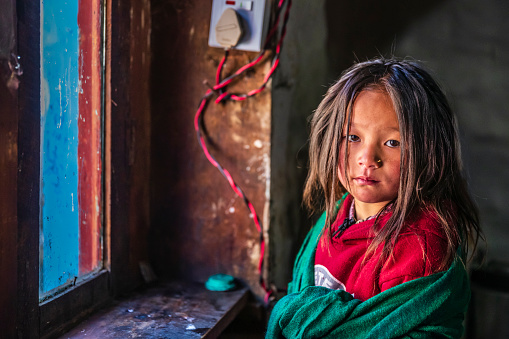 Portrait of little girl, Mount Everest National Park. This is the highest national park in the world, with the entire park located above 3,000 m ( 9,700 ft). This park includes three peaks higher than 8,000 m, including Mt Everest. Therefore, most of the park area is very rugged and steep, with its terrain cut by deep rivers and glaciers.