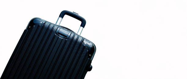 istock Black suitcase isolated on white background,Black Trolley Bag Isolated on White Background. Zipperless Hand Luggage Bag. Vip Trolley Bag. Trolley Travel Bag. Spinner Trunk. Wheeled Luggage. Side View Modern Suitcase 1698369707