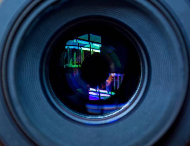 istock macro camera lens,Photo Camera or Video lens close-up on black background DSLR objective 1698371920