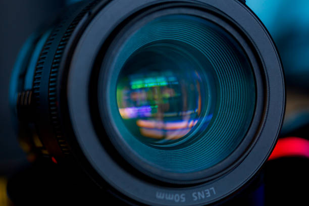 istock macro camera lens,Photo Camera or Video lens close-up on black background DSLR objective 1698371921