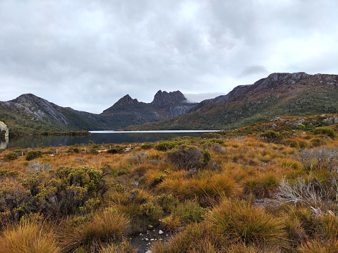View at iconic Cradle Mountain and Dove Lake, a national park in the Central Highlands region of Tasmania. The mountain is situated in the Cradle Mountain-Lake St Clair National Park.\nAt 1,545 metres, it is the sixth-highest mountain in Tasmania.