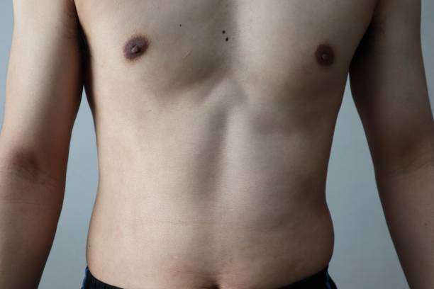 istock Japanese man with belly fat 1698390864