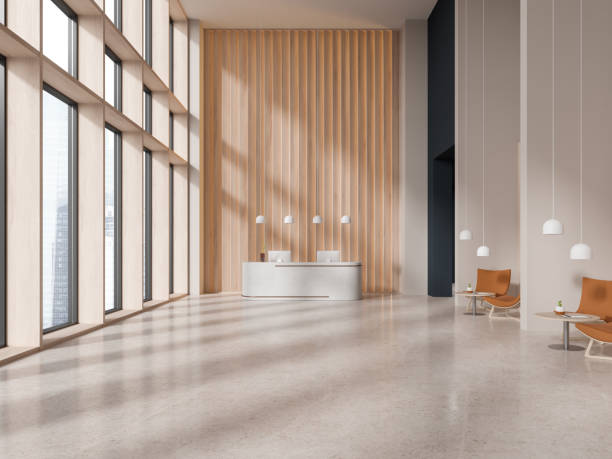 istock Wooden office interior with reception desk and relax area with panoramic window 1698390903