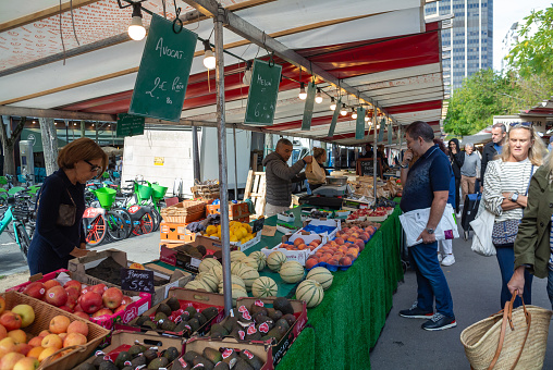 Farmer's market stall in spring - fresh herbs and spring onions