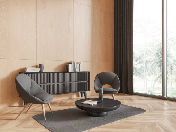 istock Wooden relaxing interior with armchairs and sideboard, panoramic window 1698395743