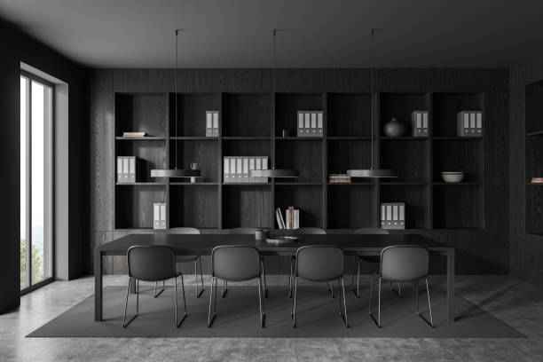 istock Grey office room interior with meeting board and shelf with decoration, window 1698396909