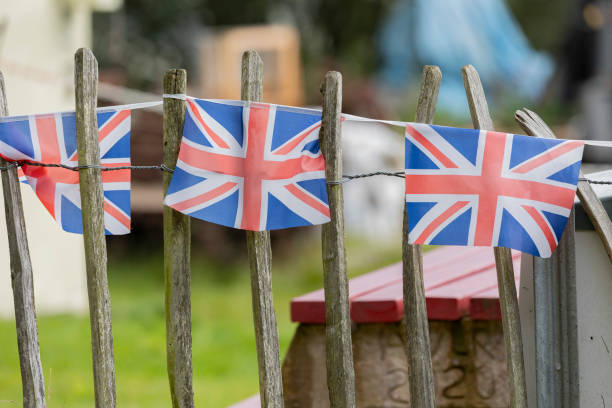 istock Union Jack bunting on a fence row 1698408393