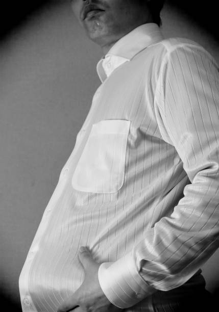 istock Image of a fat businessman 1698415208